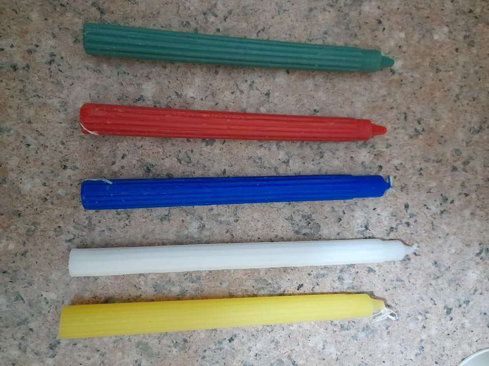 Ukuphahla With Red Candle